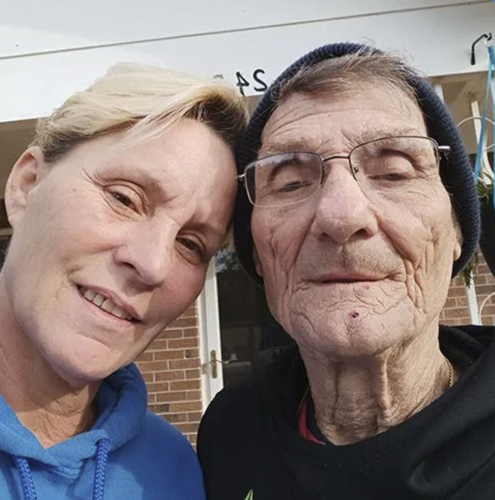 picture of Andrew K. in front of a house
